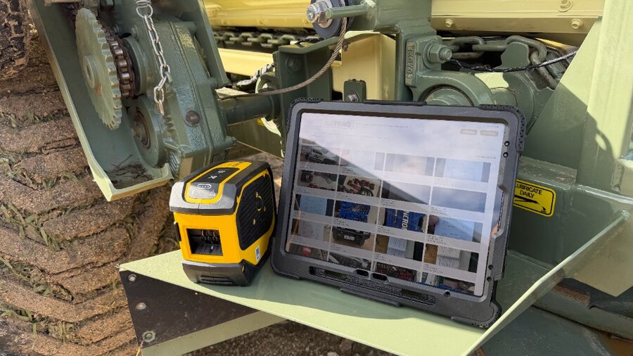 Brady M511 label printer paired with a rugged iPad running AXITRAQ in the field