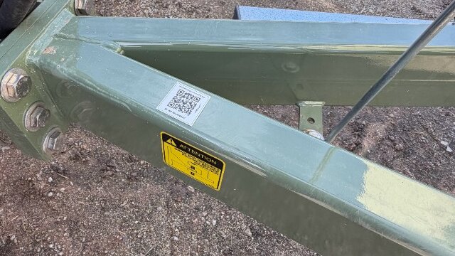 Generic pre-printed AXITRAQ QR code sticker assigned to a trailer in the field